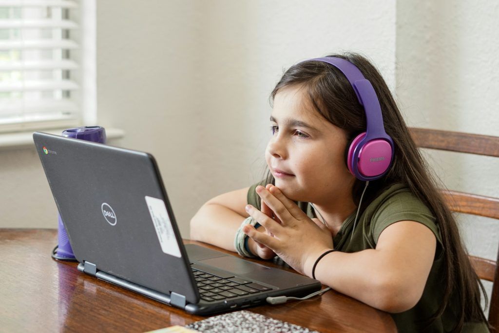 girl-sits-near-the-laptop